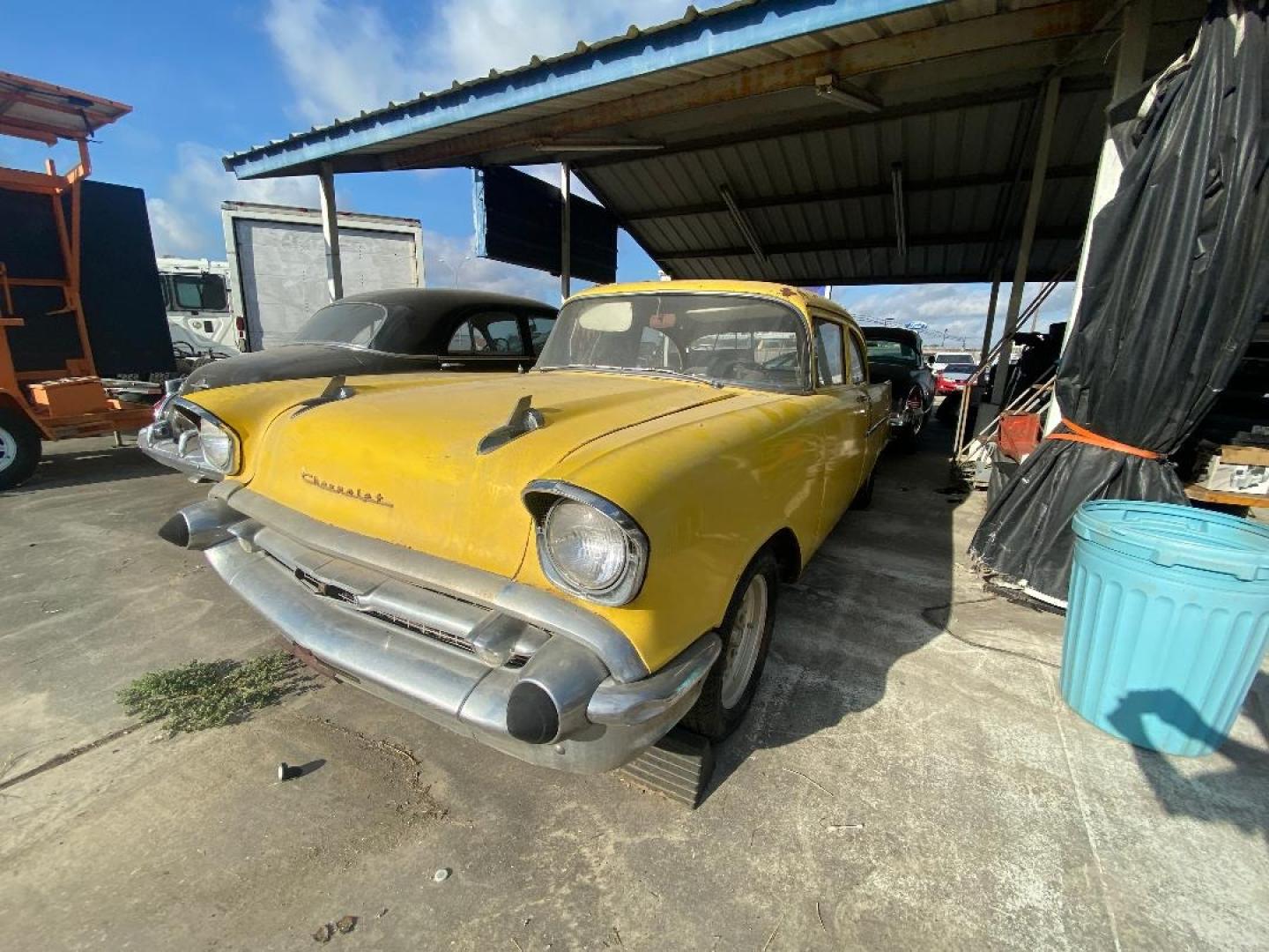 1957 Yellow /Tan Chevrolet 150 (C56A020067) with an 327 V8 engine, 4 Spd transmission, located at 1687 Business 35 S, New Braunfels, TX, 78130, (830) 625-7159, 29.655487, -98.051491 - Sittin under a shed find!! 1957 Chevrolet 150 once in its life was running the drag strip. Miles unknown equipped with a 327 V8 paired with a 4 speed transmission within a shatter proof bell housing. 12 Years in New Braunfels previously race car in California. Ready for total restoration - Photo#0